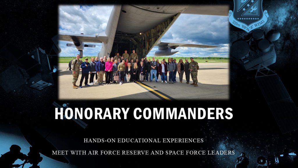 A slide with a group photo of honorary commanders for the 310th Space Wing